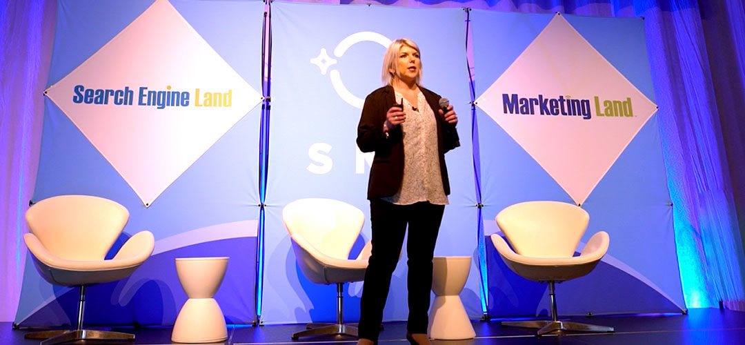 Amanda Friedt on the main stage with Search Engine Land and Marketing Land backdrops.